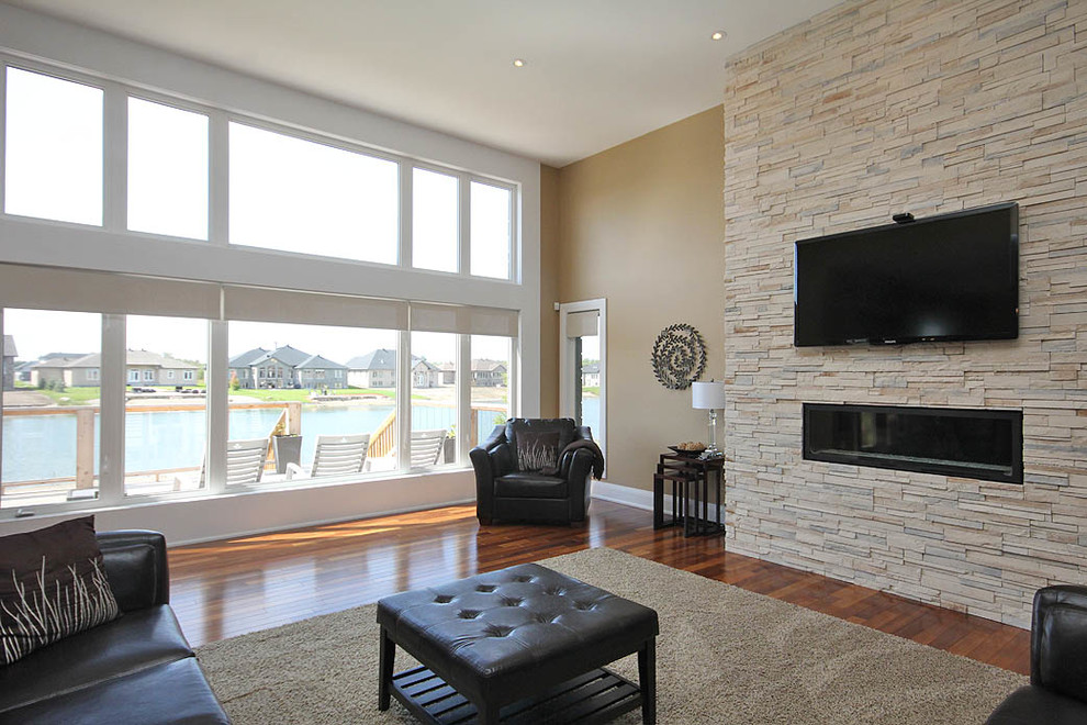Photo of a contemporary family room in Toronto.