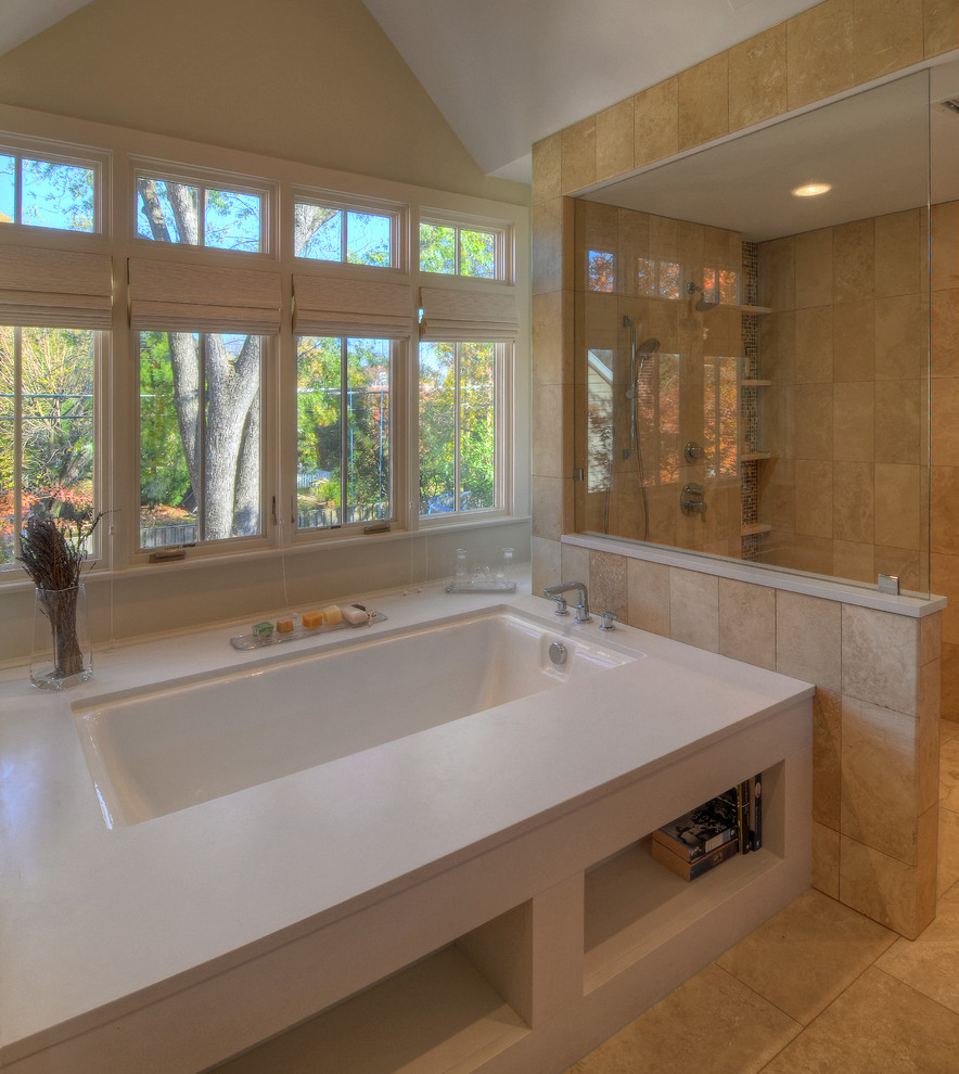 Large contemporary master bathroom in DC Metro with an undermount sink, flat-panel cabinets, dark wood cabinets, engineered quartz benchtops, an undermount tub, a curbless shower, a one-piece toilet, brown tile, stone tile, brown walls and travertine floors.
