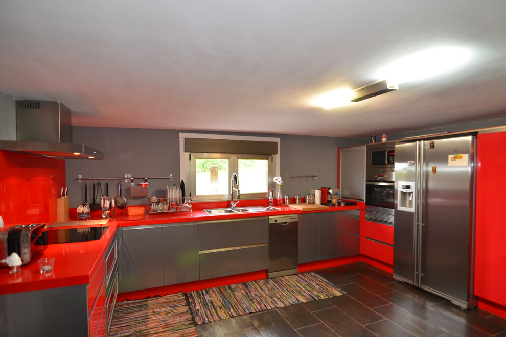 Photo of a large contemporary l-shaped separate kitchen in Other with a double-bowl sink, flat-panel cabinets, grey cabinets, quartz benchtops, red splashback, stainless steel appliances and no island.
