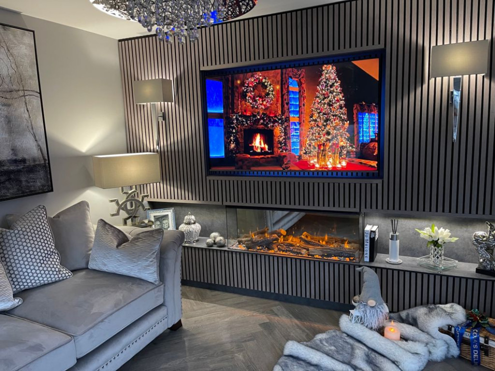 Inspiration for a medium sized modern formal open plan living room feature wall in Glasgow with grey walls, vinyl flooring, a hanging fireplace, a plastered fireplace surround, a wall mounted tv, grey floors and a feature wall.