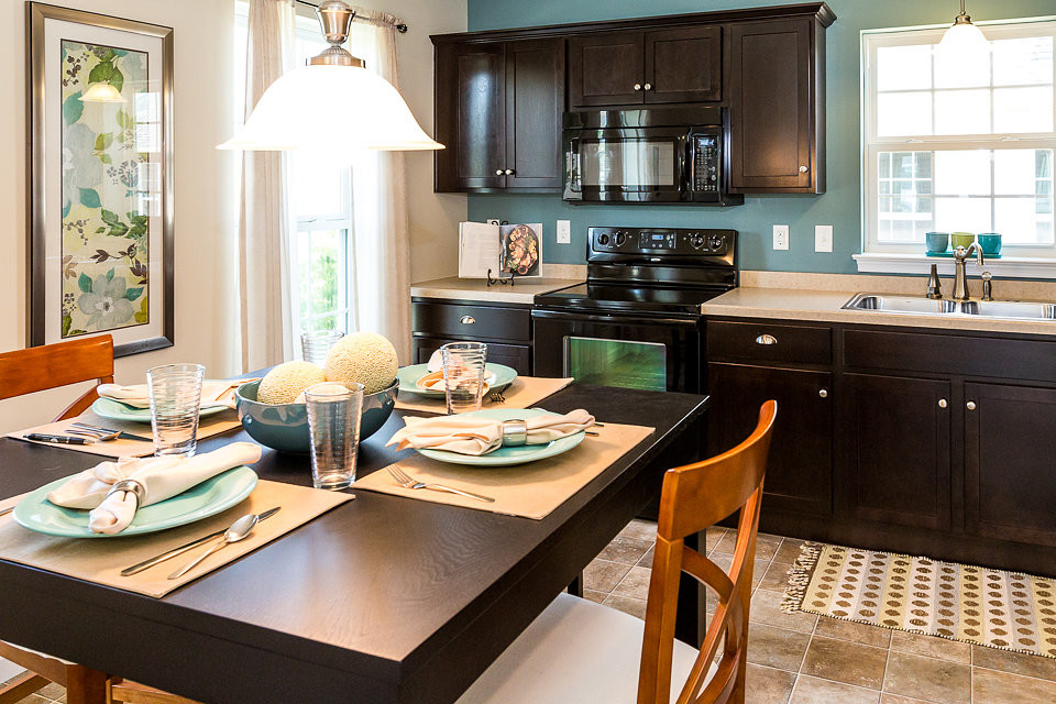 Example of a transitional kitchen design in Denver