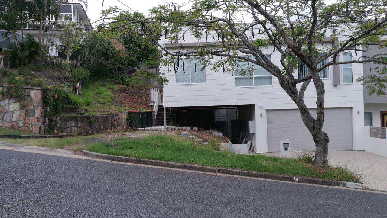 unexcavated portion showed ugly undercroft to the street