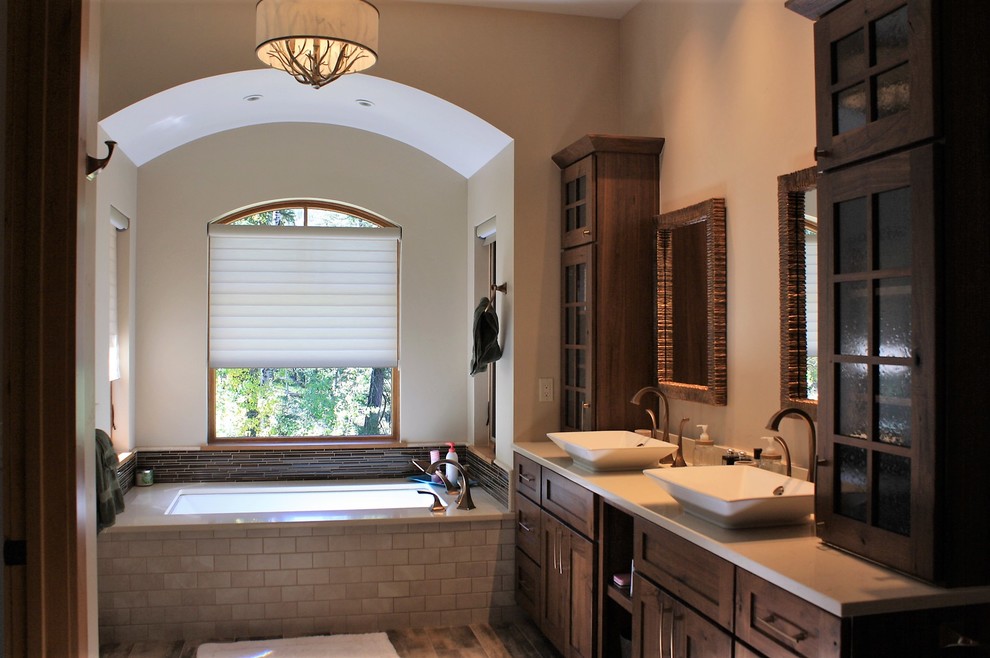 Example of a large mountain style master brown floor bathroom design with quartz countertops