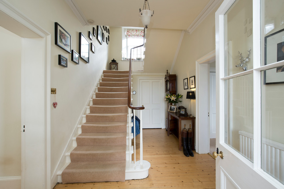 Traditional painted wood straight staircase in Edinburgh with painted wood risers.