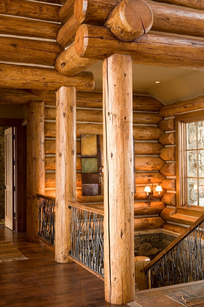Example of a mountain style u-shaped staircase design in Denver
