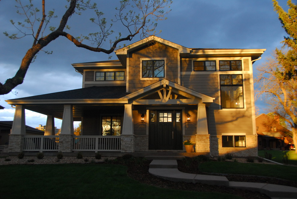 Photo of a mid-sized arts and crafts split-level brown exterior in Denver with mixed siding.