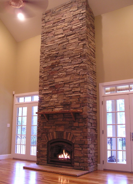 Impressive Stone Fireplace Traditional Living Room Other