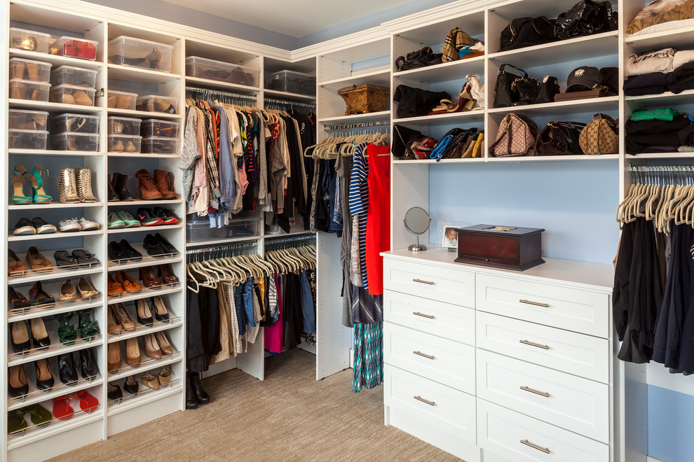 Design ideas for a large transitional women's walk-in wardrobe in Baltimore with shaker cabinets, white cabinets, carpet and beige floor.