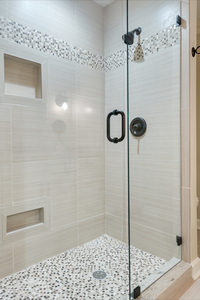 Photo of a mid-sized transitional kids bathroom in Atlanta with an undermount sink, recessed-panel cabinets, white cabinets, granite benchtops, an alcove shower, a one-piece toilet, beige tile, porcelain tile, beige walls and porcelain floors.