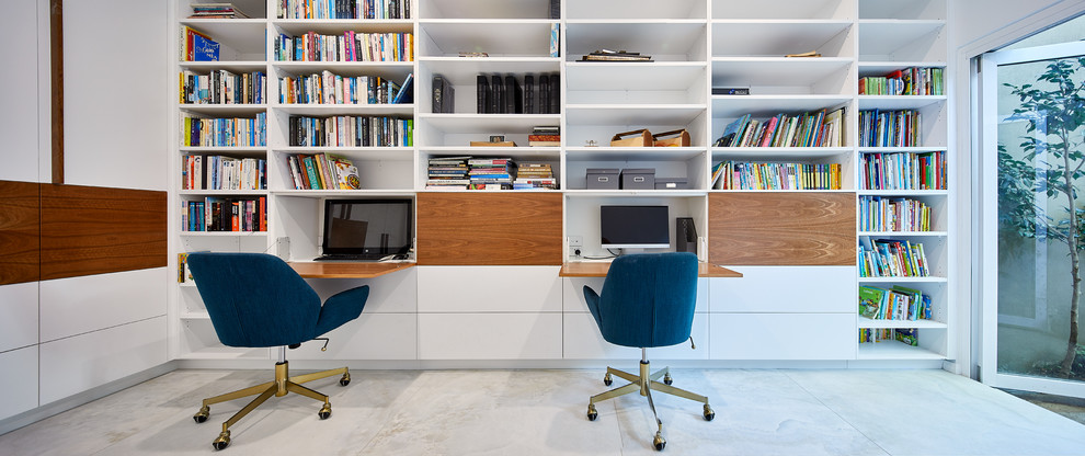 Design ideas for a contemporary home office in Sydney with porcelain floors.