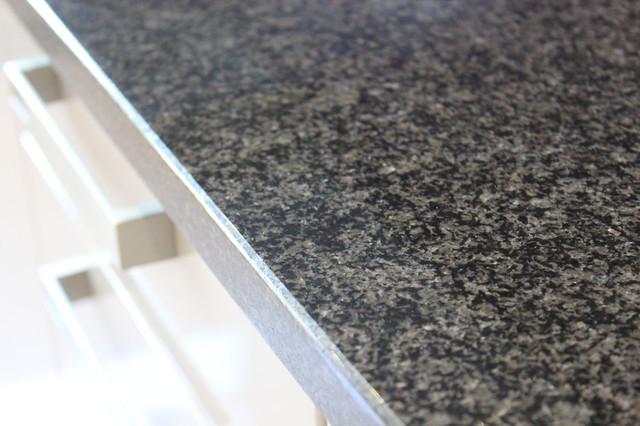A German Kitchen with Glass Splashback in Stanmore by Kudos Interior Designs transitional-kitchen