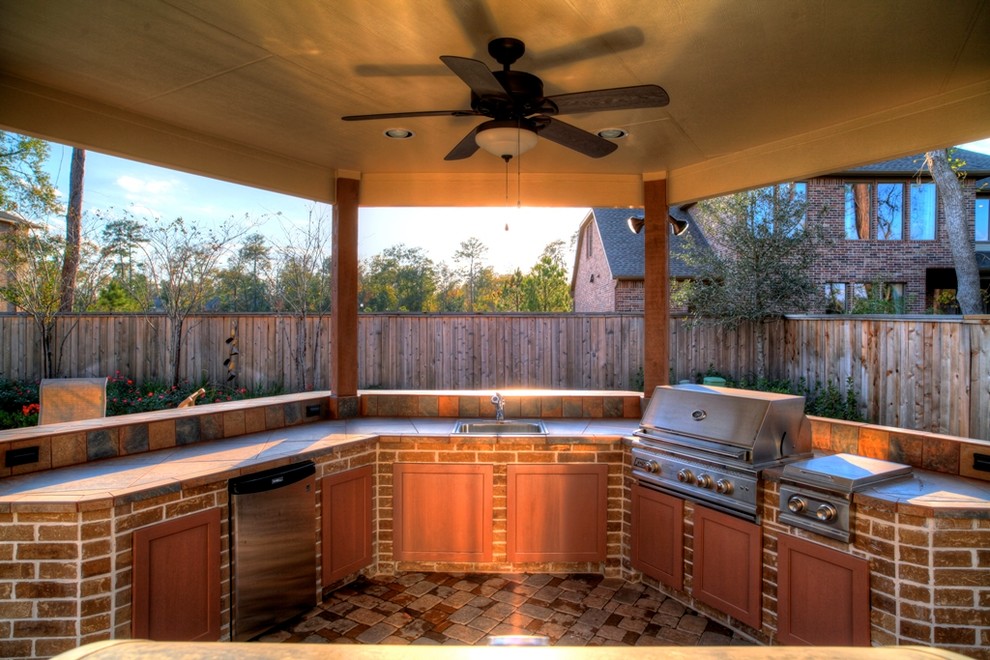 Outdoor Kitchen with stone pavers Transitional Patio Houston by Absolutely Outdoors