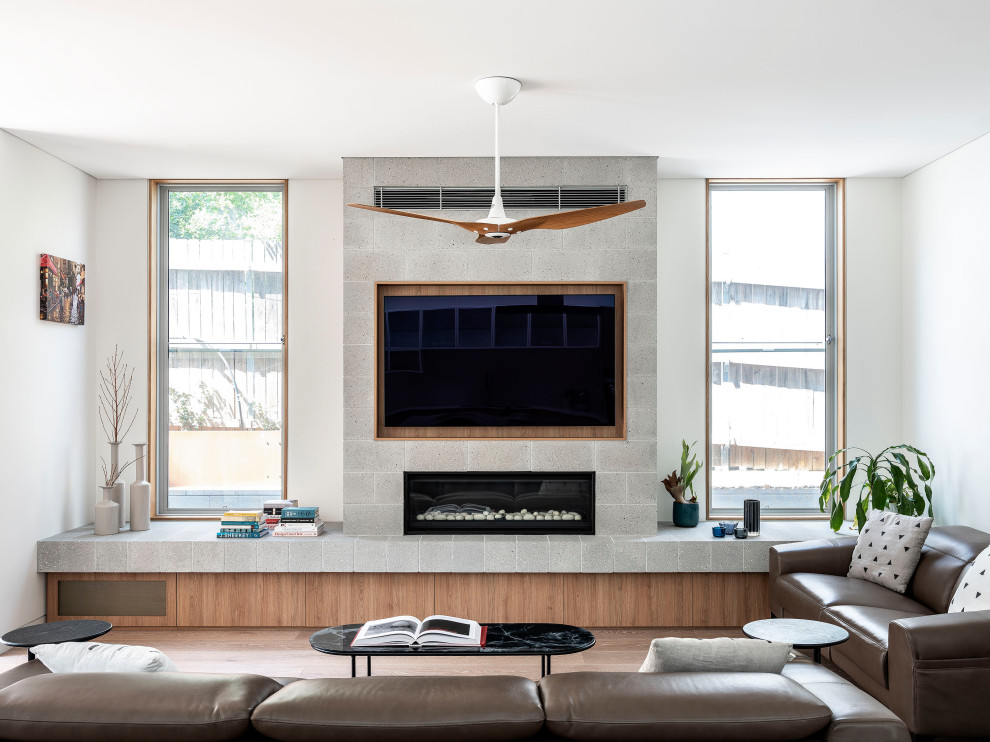 Example of a trendy living room design in Sydney