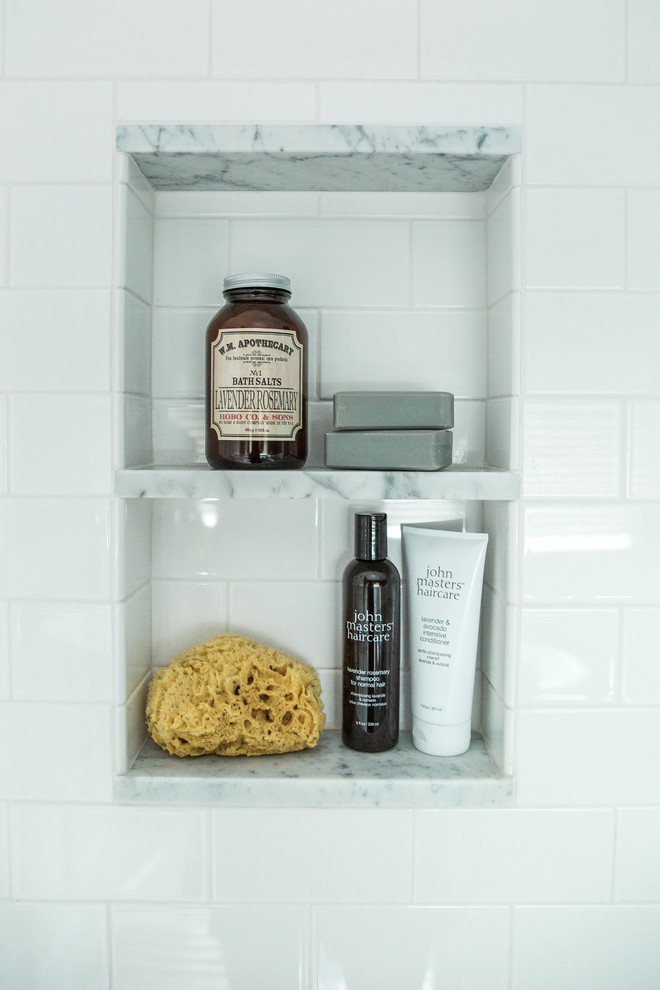 Inspiration for a mid-sized eclectic master white tile marble floor claw-foot bathtub remodel in Boston with shaker cabinets, white cabinets, a two-piece toilet, gray walls and an undermount sink