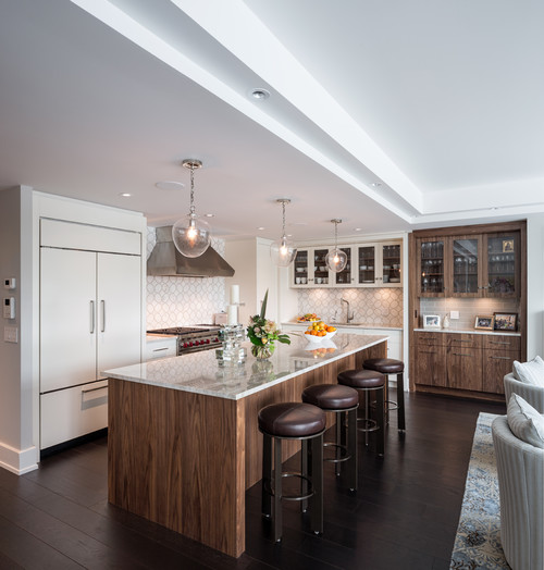 Completed DIY Kitchen Cabinet Mississauga project featuring a large walnut island and white perimeter cabinetry