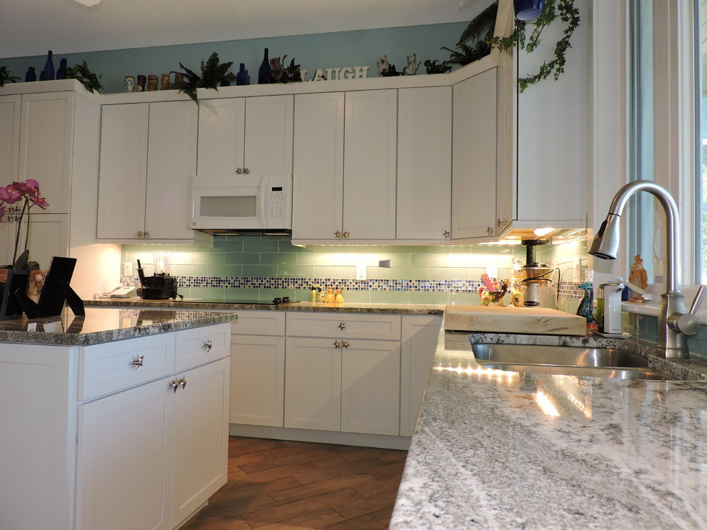 Photo of a medium sized beach style kitchen in Tampa.