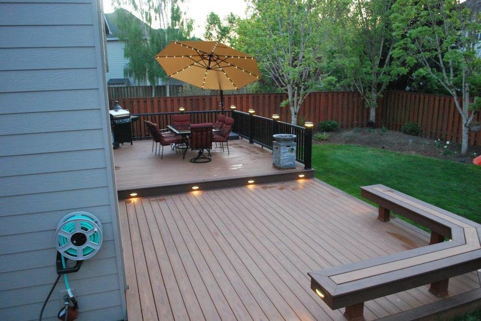 Mid-sized backyard balcony deck photo in Burlington with no cover