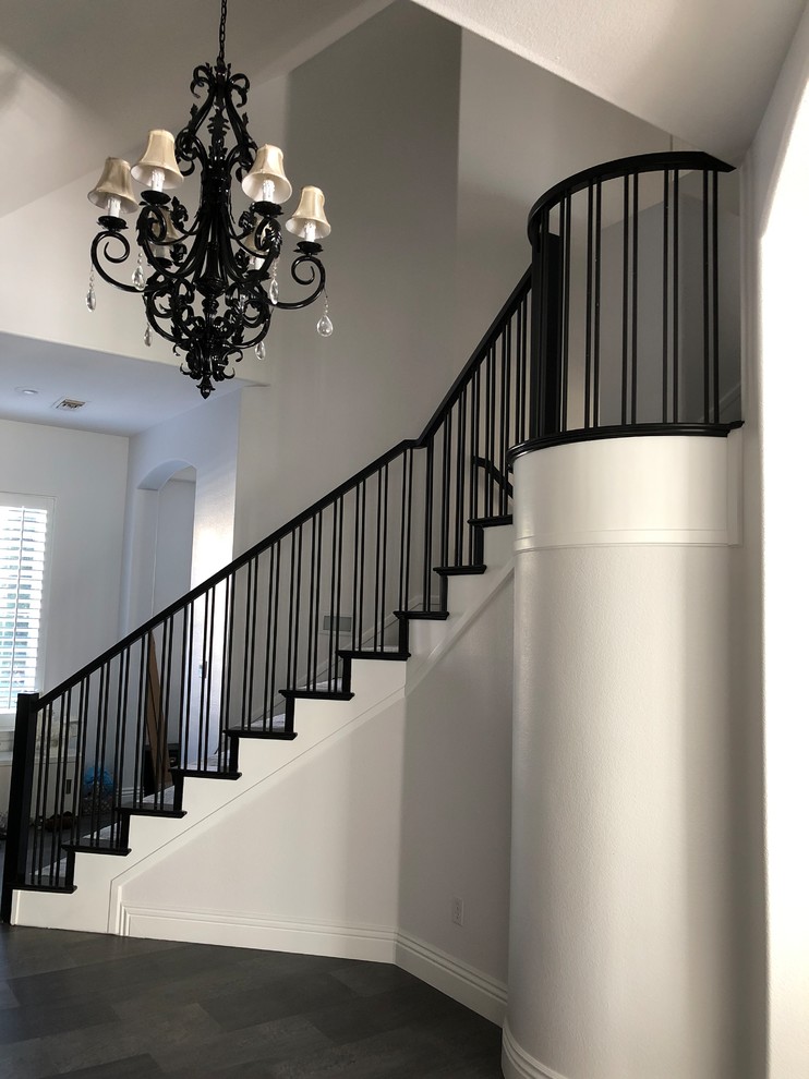 Queensridge Staircase Retrofit and Cabinet Refinish