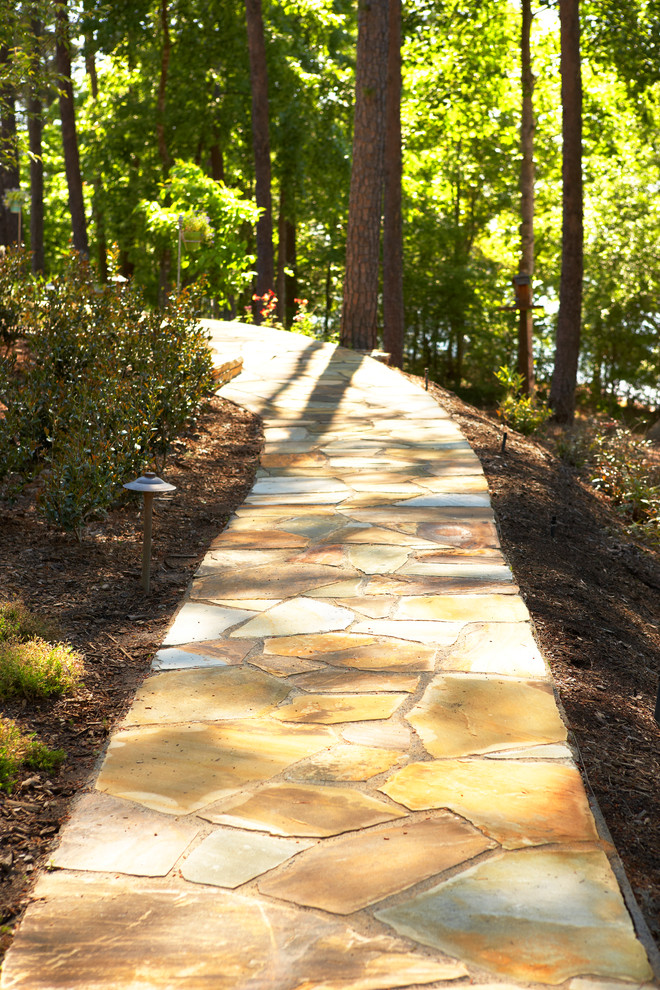 Inspiration for a rustic shade backyard landscaping.