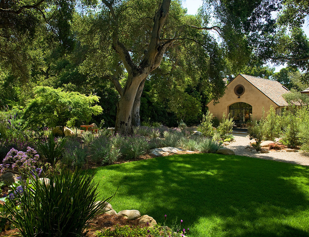 This is an example of a mediterranean backyard garden in Santa Barbara.