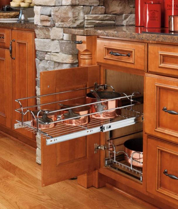 Kitchen - rustic light wood floor and brown floor kitchen idea in Chicago with beaded inset cabinets, medium tone wood cabinets, granite countertops and stainless steel appliances