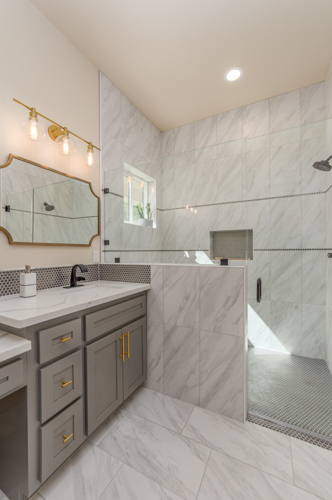 Mid-sized transitional master bathroom in Sacramento with shaker cabinets, grey cabinets, a curbless shower, ceramic floors, an undermount sink, quartzite benchtops, a hinged shower door, white benchtops, a shower seat, a double vanity and a built-in vanity.