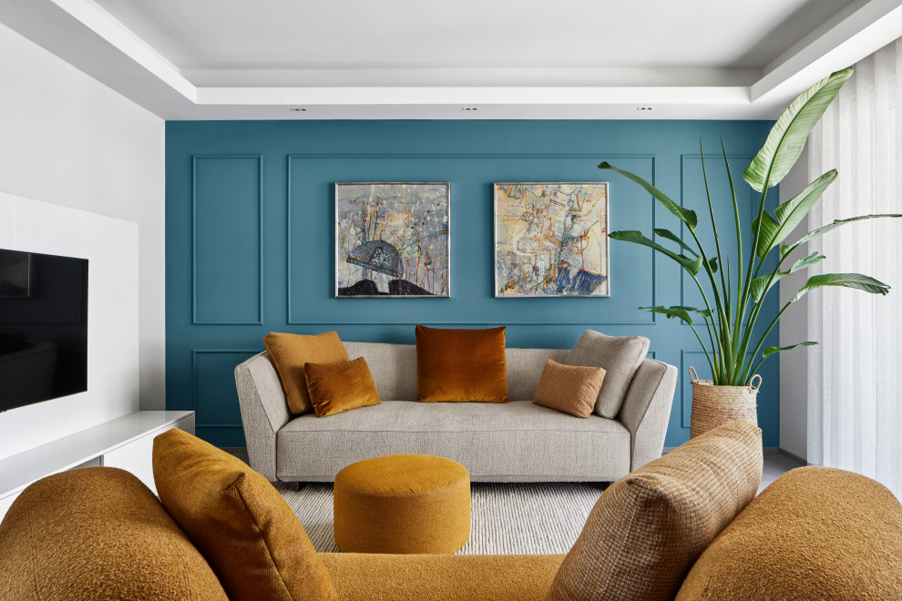 Ispirazione per un ampio soggiorno minimal con pareti verdi, pavimento in gres porcellanato, TV a parete, pavimento grigio, boiserie e tappeto
