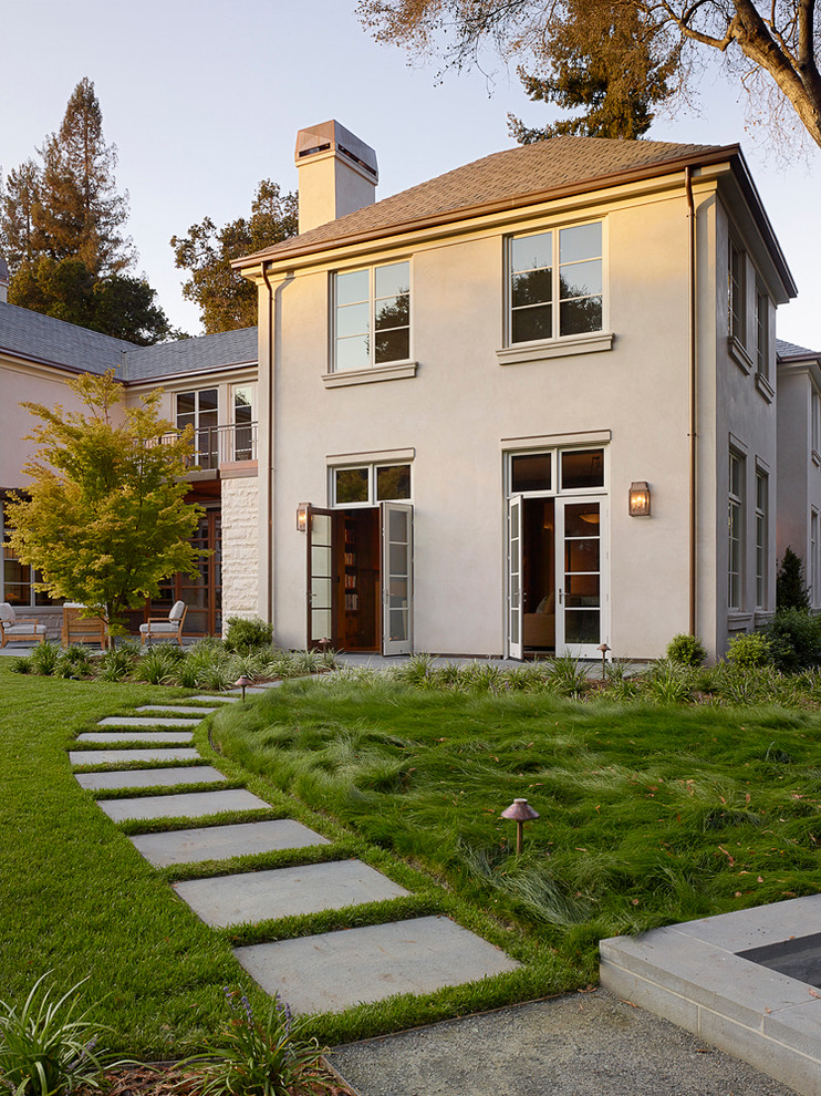 Photo of an expansive transitional backyard partial sun garden in San Francisco with a garden path and natural stone pavers.