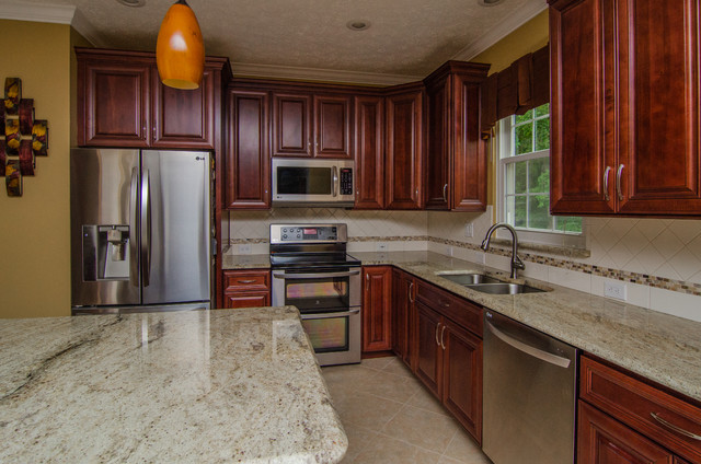 Golden Ivory Granite With Cherry Cabinets Traditional Kitchen