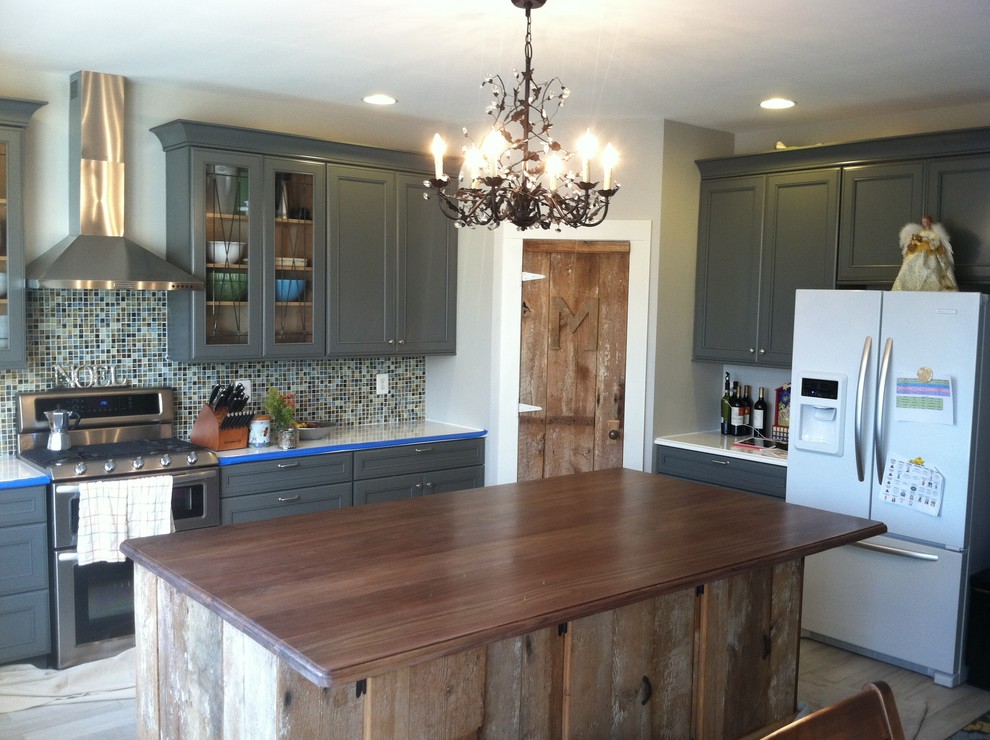 Eat-in kitchen - large transitional u-shaped porcelain tile eat-in kitchen idea in DC Metro with an undermount sink, recessed-panel cabinets, gray cabinets, quartz countertops, multicolored backsplash, glass sheet backsplash, stainless steel appliances and an island