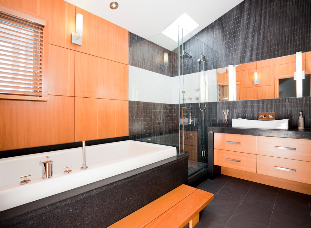 Contemporary bathroom in Vancouver with a vessel sink.