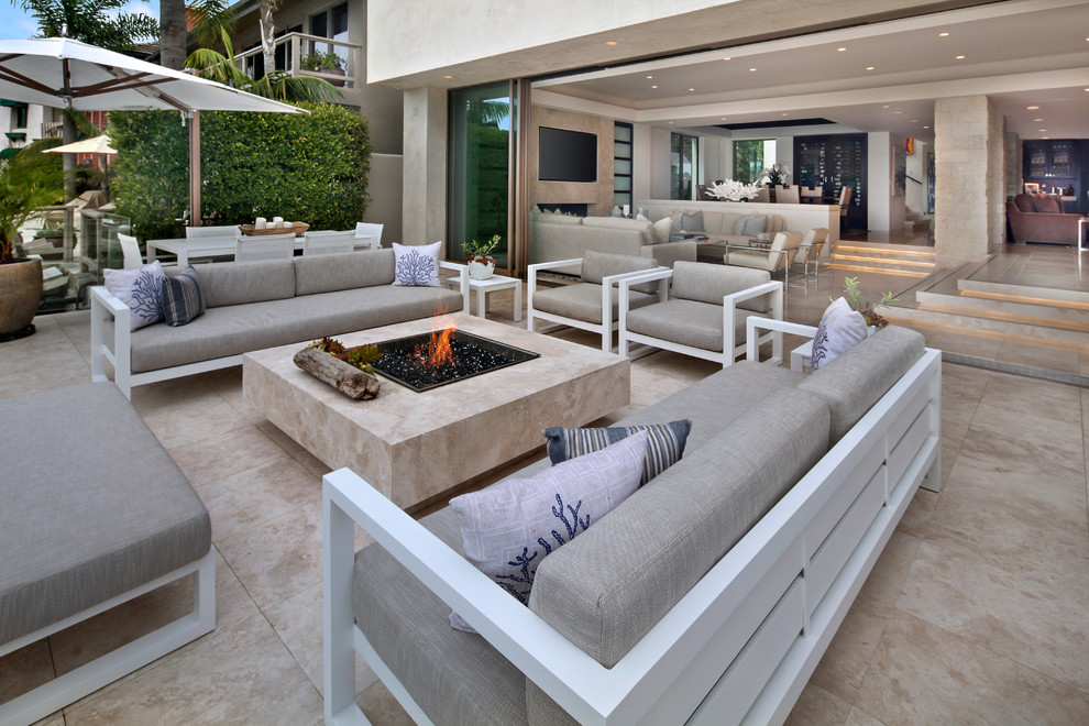 Design ideas for a contemporary patio in Orange County with a fire feature, decomposed granite and no cover.