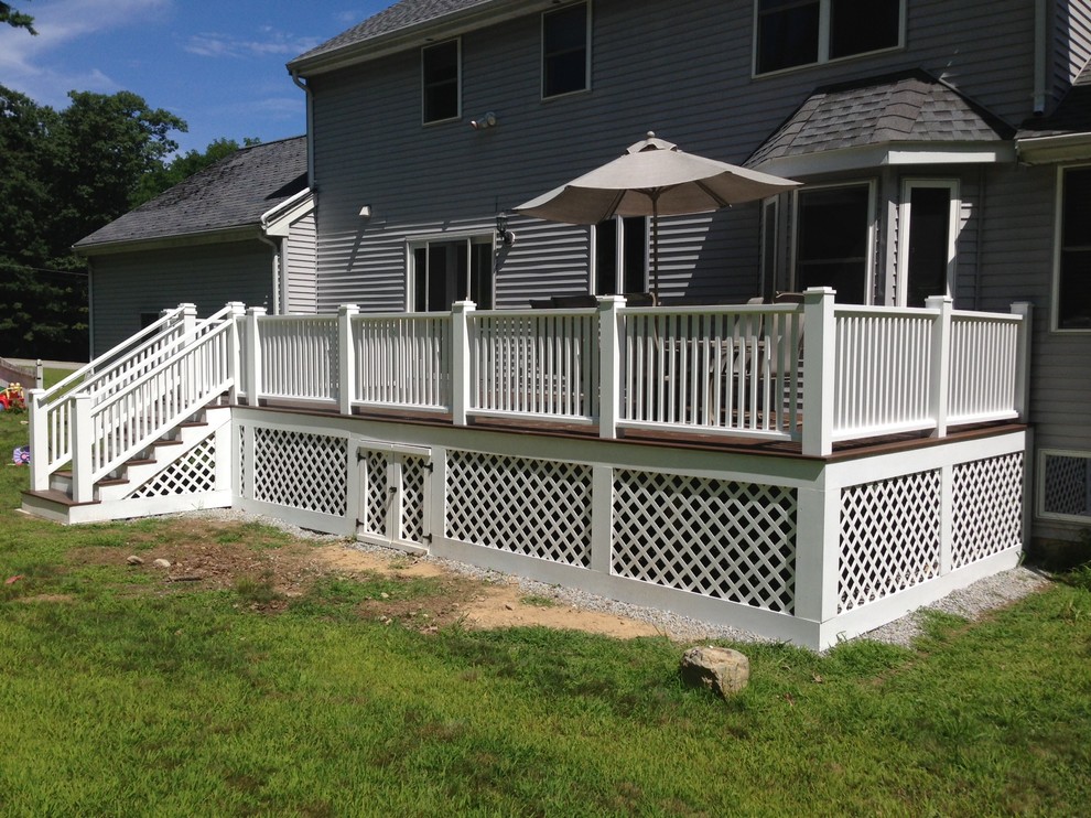 Deck - large traditional backyard deck idea in Boston with no cover