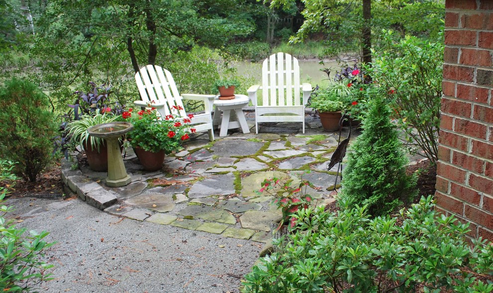 Design ideas for a mid-sized traditional backyard shaded formal garden in Other.
