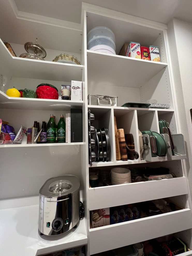 Photo of a medium sized modern kitchen pantry in Seattle.
