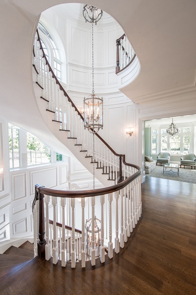 Design ideas for an expansive traditional wood straight staircase in New York with wood risers.