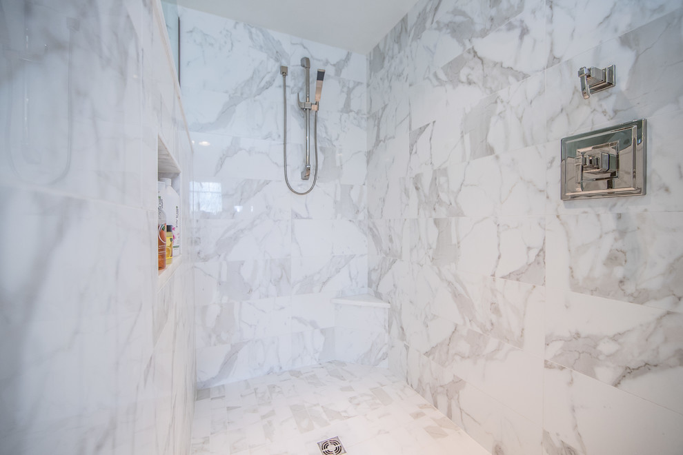 Inspiration for a large country master bathroom in DC Metro with raised-panel cabinets, white cabinets, a drop-in tub, white tile, stone tile, grey walls, marble floors, an undermount sink, marble benchtops and an open shower.