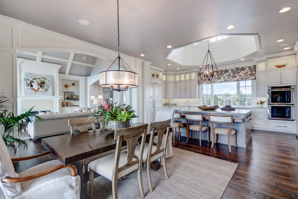 Example of a transitional home design design in Denver