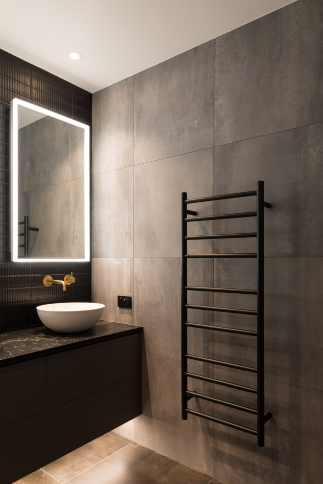Inspiration for a mid-sized industrial master bathroom in Perth with flat-panel cabinets, distressed cabinets, an open shower, porcelain tile, black walls, concrete floors, solid surface benchtops, black floor, an open shower, a niche and a floating vanity.