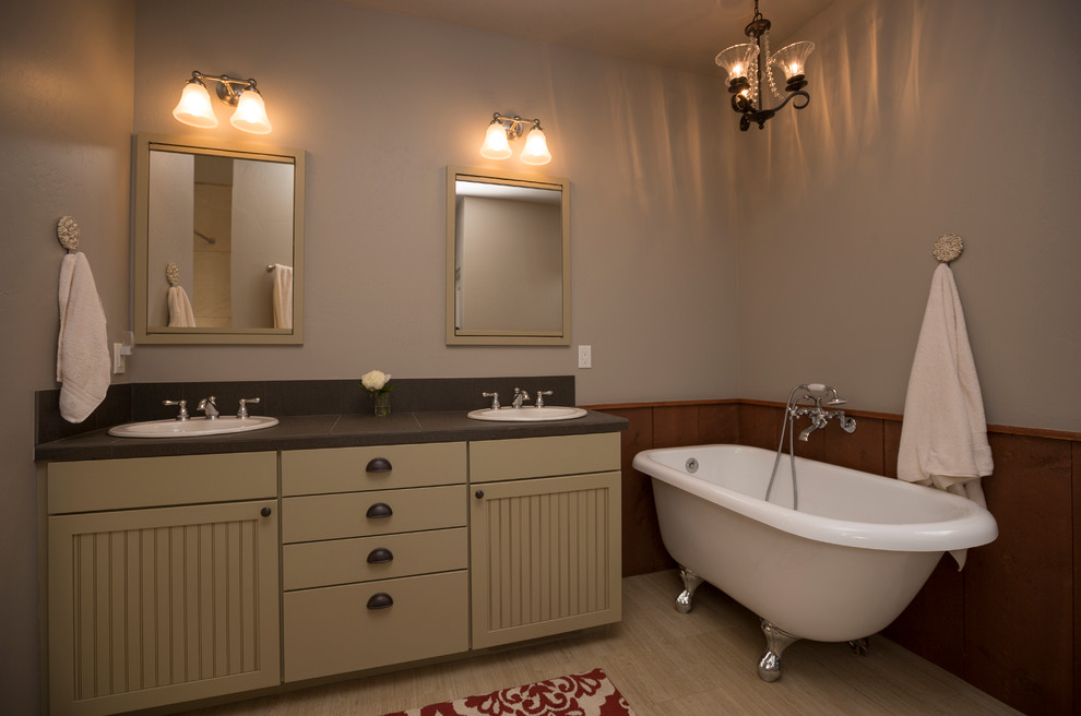 Example of a mid-sized mountain style master bathroom design in Albuquerque with a drop-in sink