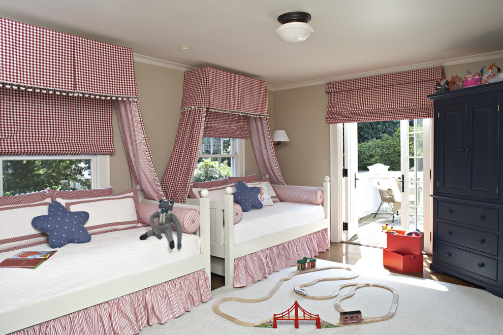 Inspiration for a traditional kids' room for girls in Seattle with beige walls.