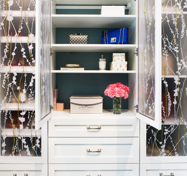 Inspiration for a large transitional women's vinyl floor dressing room remodel with open cabinets and white cabinets