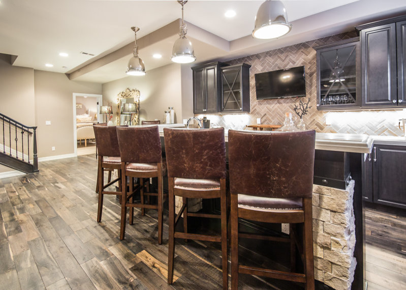 Example of a mountain style basement design in Denver