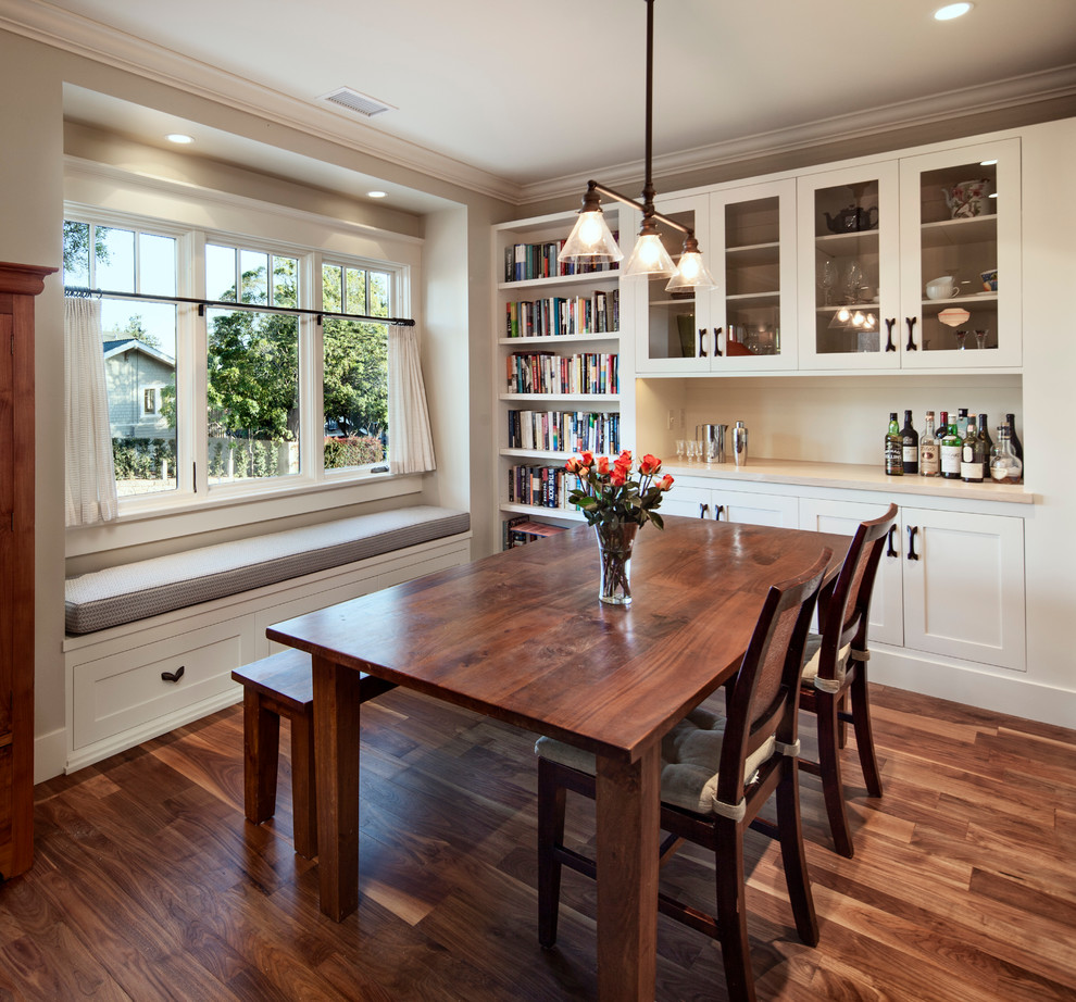 Photo of a small arts and crafts open plan dining in Santa Barbara with grey walls and dark hardwood floors.
