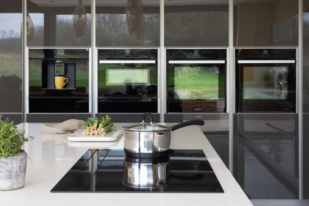 Example of a trendy kitchen design in Hampshire