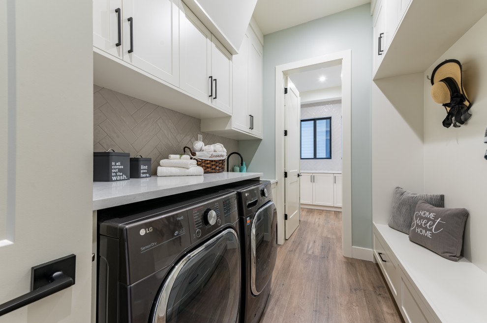 Example of a farmhouse laundry room design in Vancouver