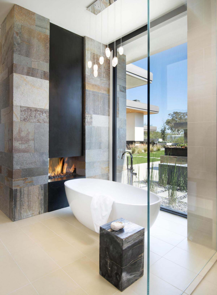 Inspiration for an expansive contemporary master bathroom in Phoenix with flat-panel cabinets, medium wood cabinets, a freestanding tub, a double shower, beige tile, porcelain tile, white walls, an undermount sink, engineered quartz benchtops, beige floor, a hinged shower door, white benchtops, an enclosed toilet, a double vanity and a built-in vanity.