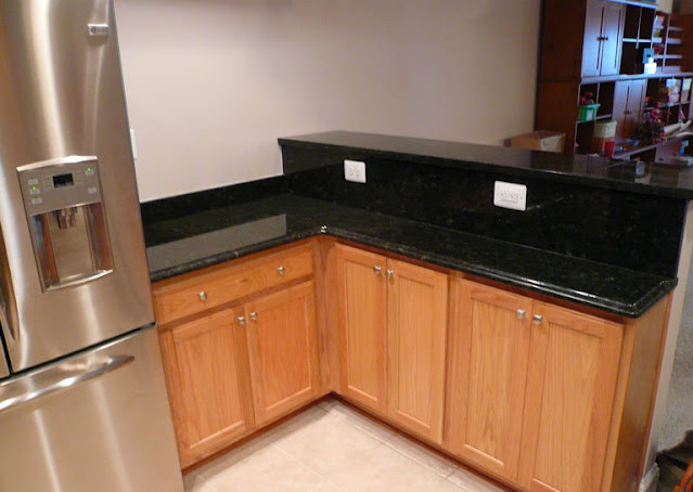 Inspiration for a transitional kitchen remodel in DC Metro with beaded inset cabinets, light wood cabinets and an island