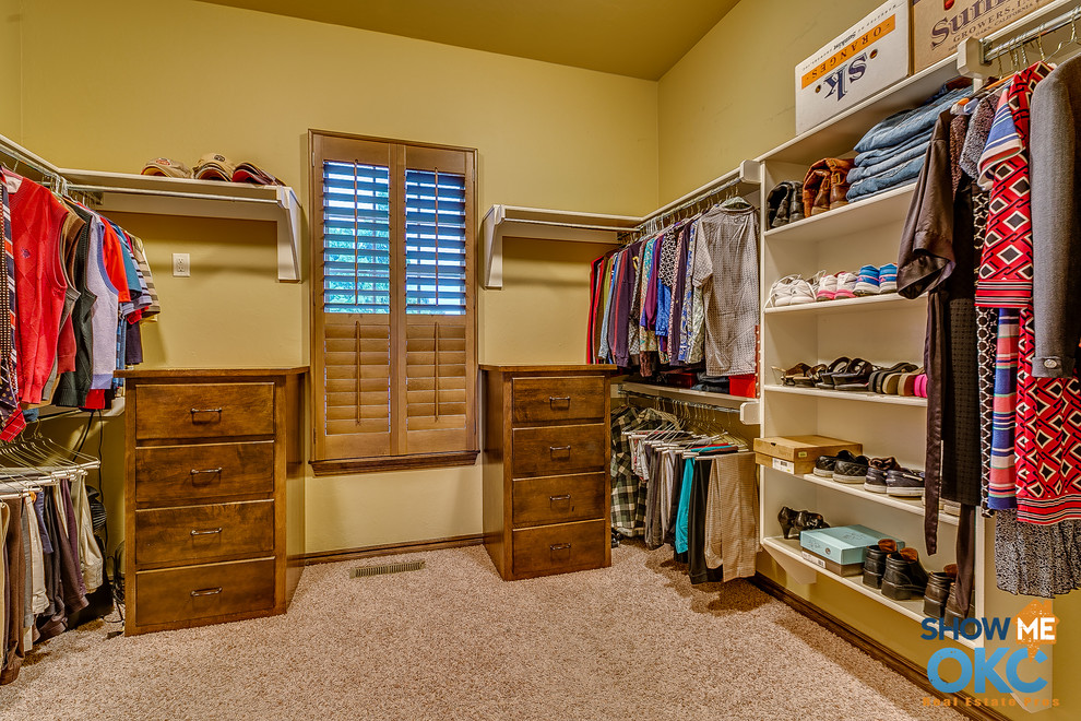Photo of a large traditional walk-in wardrobe in Oklahoma City.