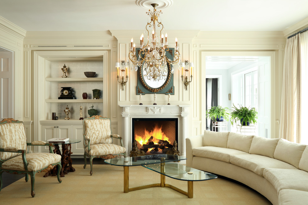 Inspiration for a large traditional formal enclosed living room in Los Angeles with a standard fireplace, beige walls, dark hardwood floors, no tv and a stone fireplace surround.